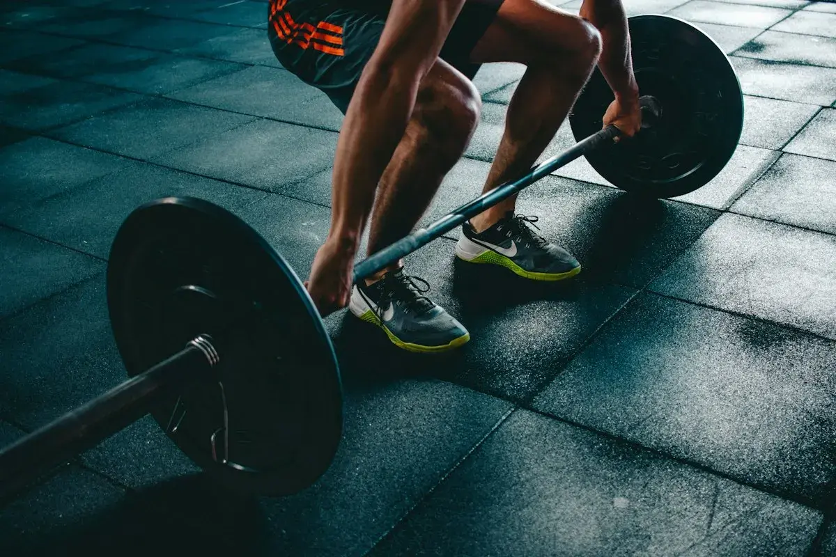 DEXAFIT Packages — barbell lift in a gym