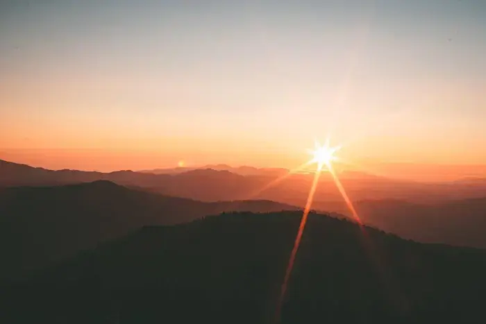 Mobile explore screen — Hill Country sunset
